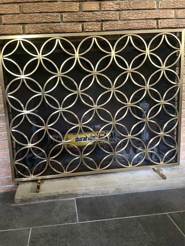 Bedford Single-Panel Fireplace Screen, shown in a room setting