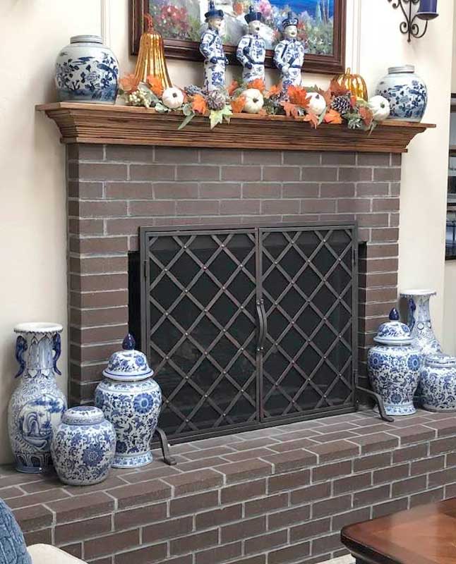 Iron Weave Door Fireplace Screen With Doors, shown in a room setting