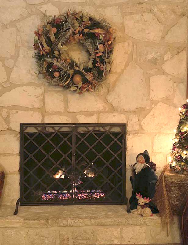Iron Weave Door Fireplace Screen With Doors, shown in a room setting