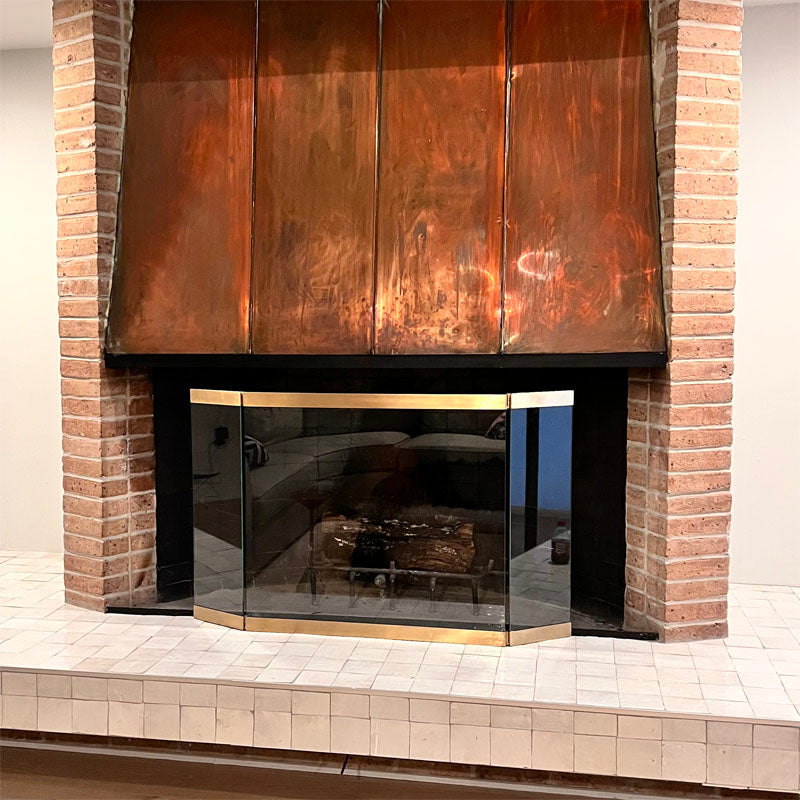 Modern Glass Folding Fireplace Screen, shown in a room setting