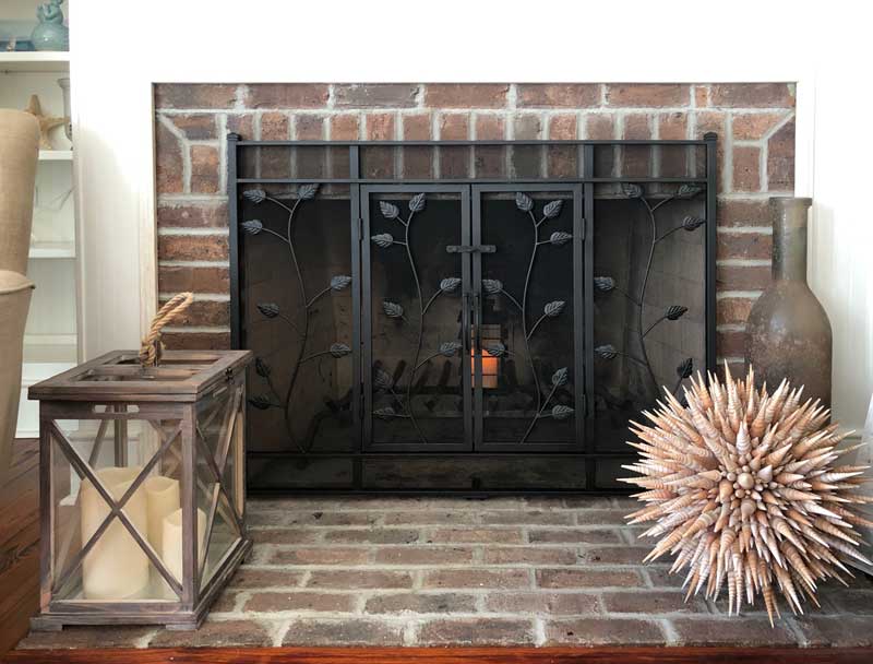 Leaf & Vine Flat Screen With Doors, shown in a room setting