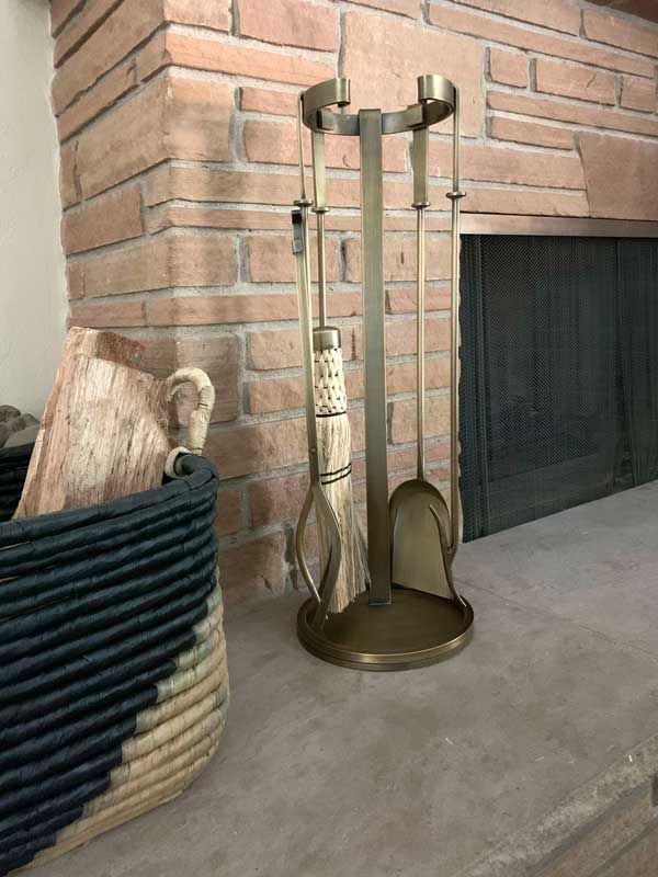 Mid Century Brass Tool Set, shown in a room setting