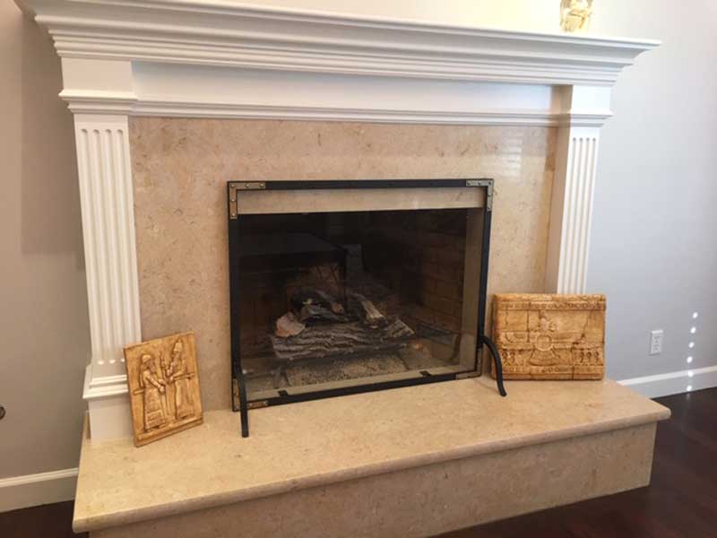 Refined Rivet Mesh Single-Panel Fireplace Screen, shown in a room setting
